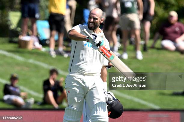 Daryl Mitchell of New Zealand celebrates after scoring a century during day three of the First Test match in the series between New Zealand and Sri...