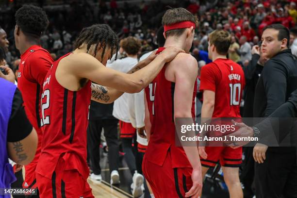 Caleb McConnell and Paul Mulcahy of the Rutgers Scarlet Knights walk off the court after a Big Ten Men's Basketball Tournament Quarterfinals game...