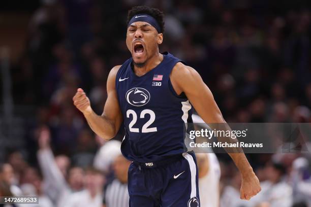 Jalen Pickett of the Penn State Nittany Lions celebrates a three pointer against the Northwestern Wildcats during overtime in the quarterfinals of...