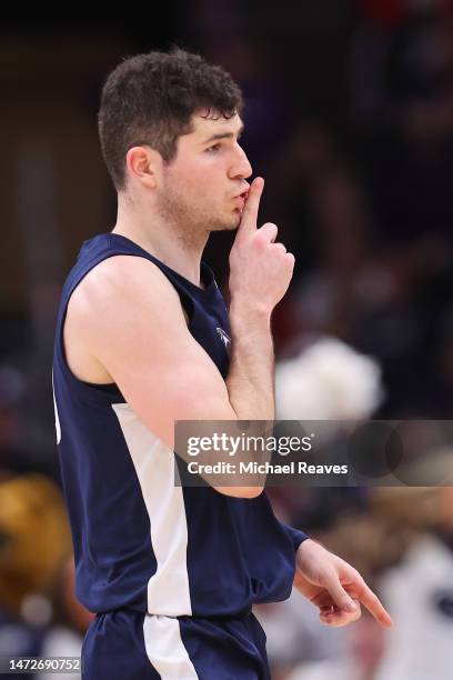 Andrew Funk of the Penn State Nittany Lions celebrates a three pointer against the Northwestern Wildcats during the second half in the quarterfinals...