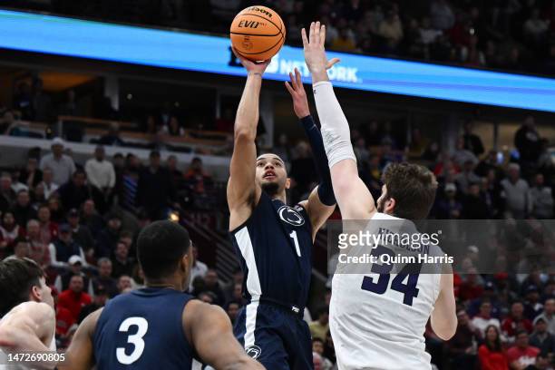 Seth Lundy of the Penn State Nittany Lions shoots against Matthew Nicholson of the Northwestern Wildcats during overtime in the quarterfinals of the...