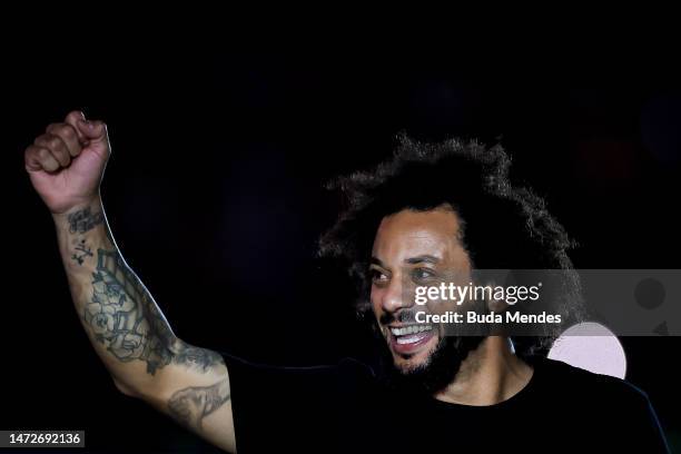 Brazilian defender Marcelo gestures to the fans during his presentation as new player of Fluminense at Maracana Stadium on March 10, 2023 in Rio de...