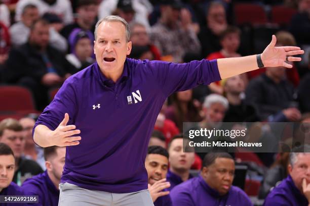 Head coach Chris Collins of the Northwestern Wildcats argues with a referee against the Penn State Nittany Lions during the second half in the...