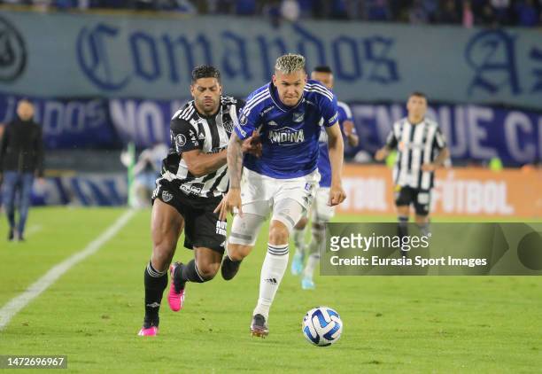 Juan Pablo Vargas of Millonarios is chased by Hulk of Atletico Mineiro during Conmebol Libertadores 2023 match between Millonarios FC and Atletico...