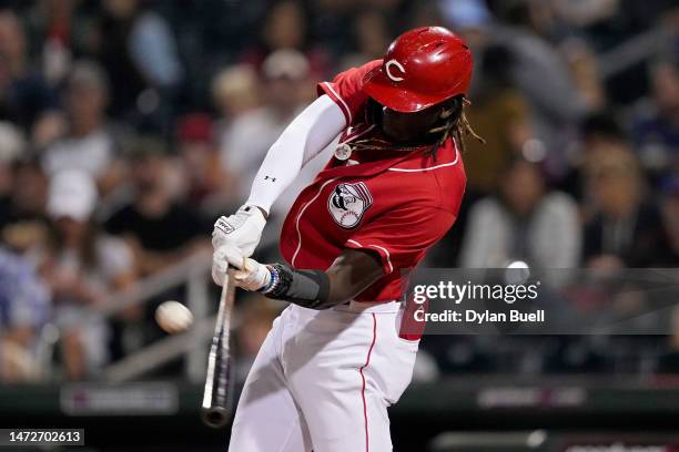 Elly De La Cruz of the Cincinnati Reds flies out in the third inning against the Arizona Diamondbacks during a spring training game at Goodyear...