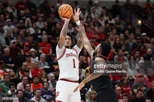 Jalen Hood-Schifino of the Indiana Hoosiers shoots against the Maryland Terrapins during the first half in the quarterfinals of the Big Ten...