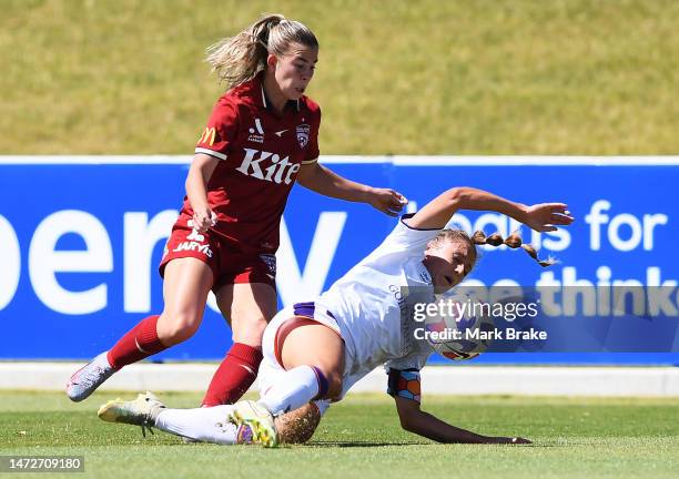 Natasha Rigby of Perth Glory competes with Emily Hodgson of Adelaide United during the round 17 A-League Women's match between Adelaide United and...