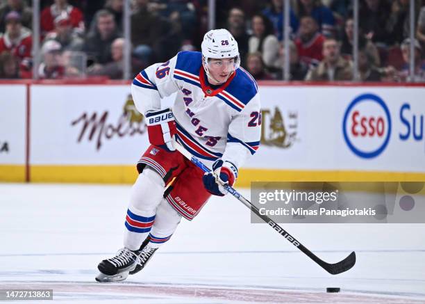 Jimmy Vesey of the New York Rangers skates the puck during the third period against the Montreal Canadiens at Centre Bell on March 9, 2023 in...