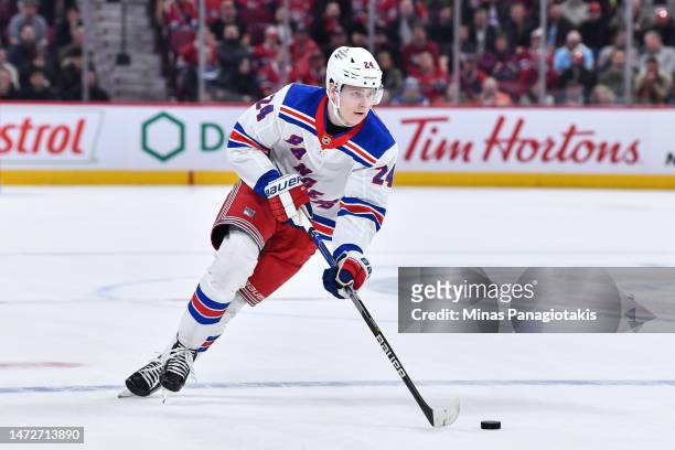 Kaapo Kakko of the New York Rangers skates the puck during the shootout against the Montreal Canadiens at Centre Bell on March 9, 2023 in Montreal,...