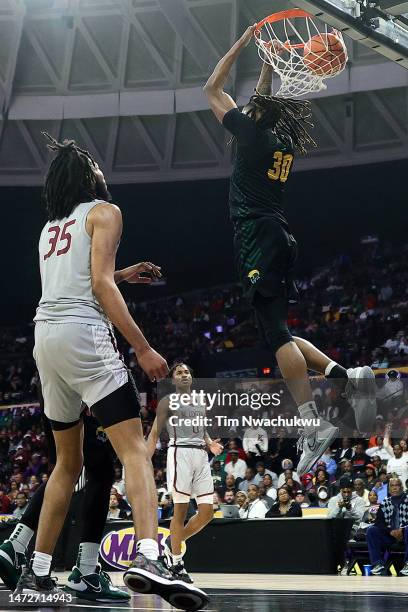 Kris Bankston of the Norfolk State Spartans dunks against the North Carolina Central Eagles during the 2023 MEAC Men's Basketball Tournament...