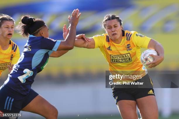 Shakira Baker of the Hurricanes Poua is tackled during the round three Super Rugby Aupiki match between Hurricanes Poua and Blues at Sky Stadium, on...