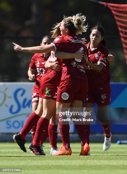 Dylan Holmes of Adelaide United celebrates after scoring her teams first goal`with Jenna McCormick of Adelaide United during the round 17 A-League...