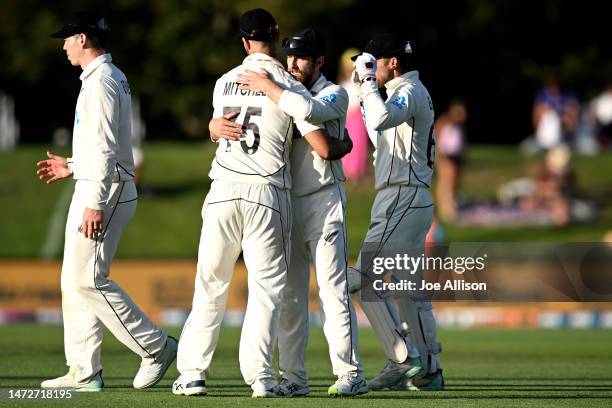 Daryl Mitchell and Kane Williamson of New Zealand share a moment at the end of day three of the First Test match in the series between New Zealand...