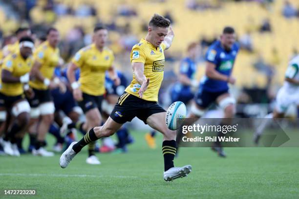 Brett Cameron of the Hurricanes kicks ahead during the round three Super Rugby Pacific match between Hurricanes and Blues at Sky Stadium, on March 11...