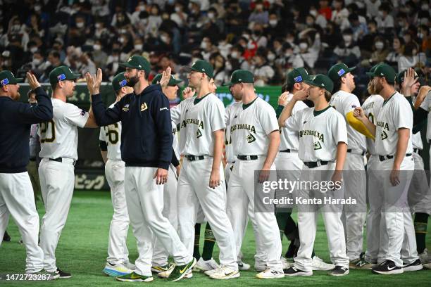 Australia players celebrate the team's 2-12 victory in the World Baseball Classic Pool B game between China and Australia at Tokyo Dome on March 11,...