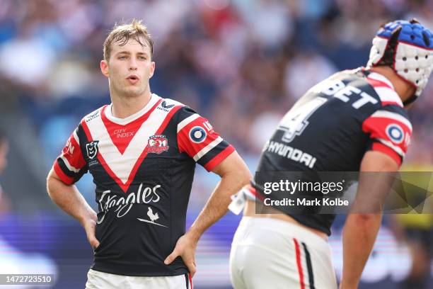 Sam Walker of the Roosters speaks to a team mate during the round two NRL match between the Sydney Roosters and the New Zealand Warriors at Allianz...