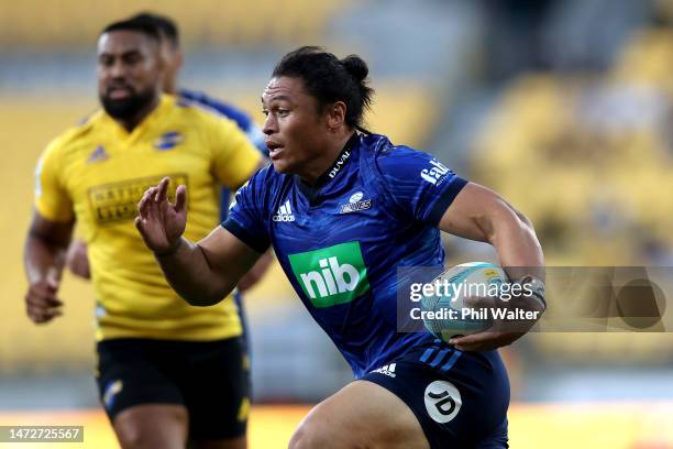 Caleb Clarke of the Blues runs in for a try during the round three Super Rugby Pacific match between Hurricanes and Blues at Sky Stadium, on March 11...