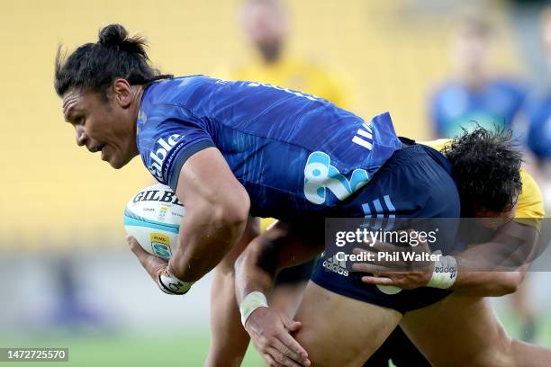 Caleb Clarke of the Blues runs in for a try during the round three Super Rugby Pacific match between Hurricanes and Blues at Sky Stadium, on March 11...