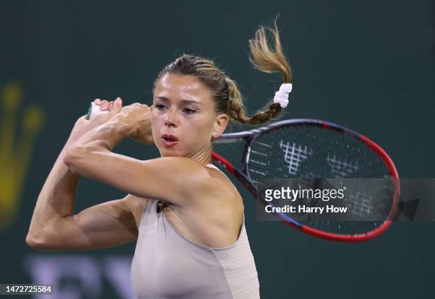 Camila Giorgi of Italy reacts after her backhand in her match against Jessica Pegula of the united States during the BNP Parisbas at the Indian Wells...