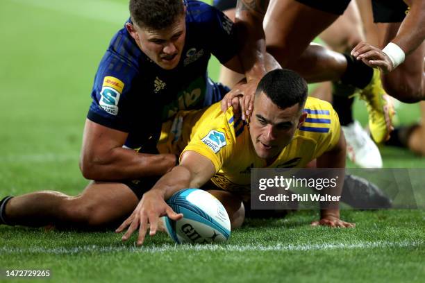 Josh Moorby of the Hurricanes scores a try during the round three Super Rugby Pacific match between Hurricanes and Blues at Sky Stadium, on March 11...