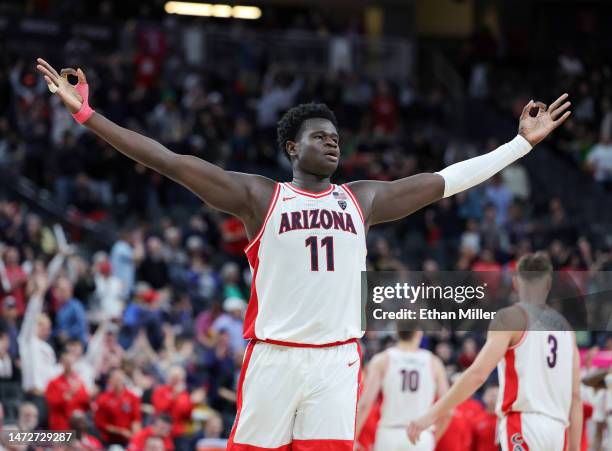 Oumar Ballo of the Arizona Wildcats gestures after teammate Pelle Larsson hit a 3-pointer against the Arizona State Sun Devils in the second half of...