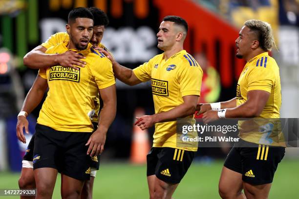 Salesi Rayasi of the Hurricanes celebrates his try during the round three Super Rugby Pacific match between Hurricanes and Blues at Sky Stadium, on...