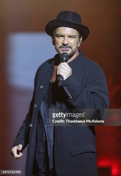 Singer Ricardo Arjona performs during a concert as part of the 'Blanco y Negro Tour' at Estadio Beto Avila on March 10, 2023 in Cancun, Mexico.