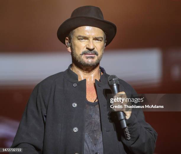 Singer Ricardo Arjona performs during a concert as part of the 'Blanco y Negro Tour' at Estadio Beto Avila on March 10, 2023 in Cancun, Mexico.