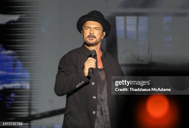 Singer Ricardo Arjona performs during a concert as part of the 'Blanco y Negro Tour' at Estadio Beto Avila on March 10, 2023 in Cancun, Mexico.