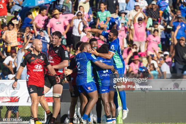 Fijian Drua celebrate after a try during the round three Super Rugby Pacific match between Fiji Drua and Crusaders at Churchill Park, on March 11 in...