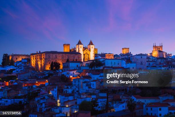 scenic view of cáceres old town at dusk - caceres stock pictures, royalty-free photos & images