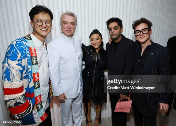 David Byrne, Stephanie Hsu, Rafiq Bhatia of Son Lux, and guests pose as Vanity Fair and Richard Mille host a private cocktail party honoring A24's...