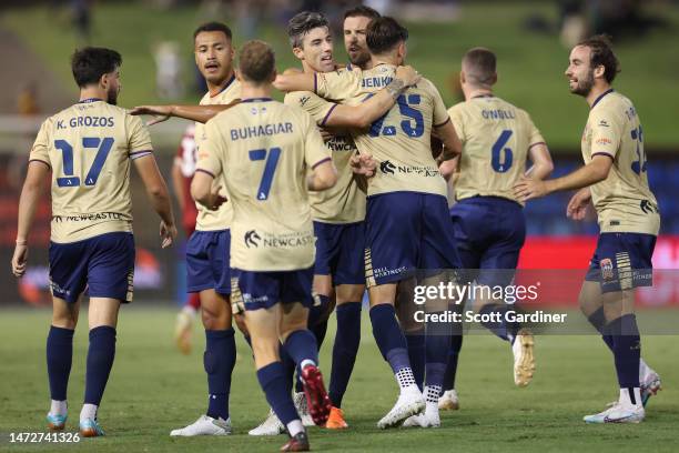 Jason Hoffman of the Jets celebrates a goal with teammates during the round 20 A-League Men's match between Newcastle Jets and Adelaide United at...