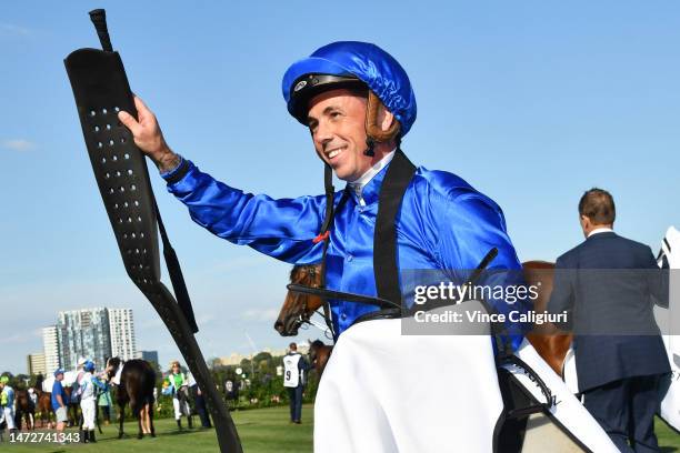 Dean Holland riding In Secret after winning Race 7, the Yulong Stud Newmarket Handicap, during Melbourne Racing at Flemington Racecourse on March 11,...