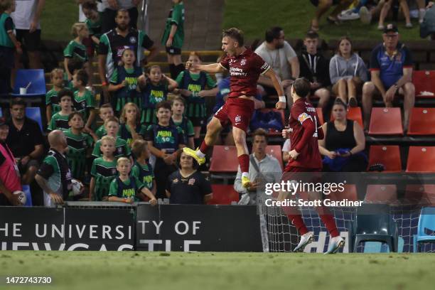 Luka Jovanovic of Adelaide United celebrates a goal with teammate during the round 20 A-League Men's match between Newcastle Jets and Adelaide United...