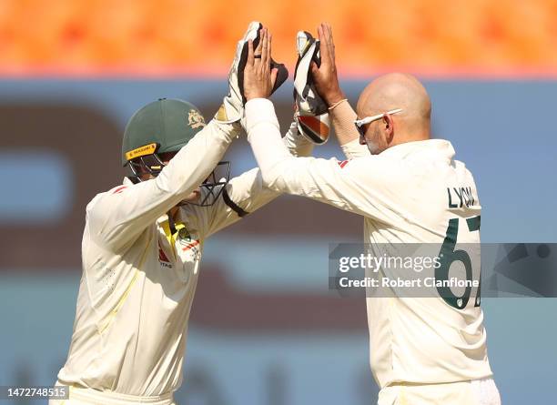 Nathan Lyon of Australia celebrates taking the wicket of Shubman Gill of India during day three of the Fourth Test match in the series between India...