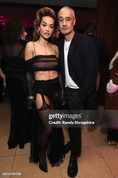 Rita Ora and Taika Waititi attend the The CAA Pre-Oscar Party at Sunset Tower Hotel on March 10, 2023 in Los Angeles, California.