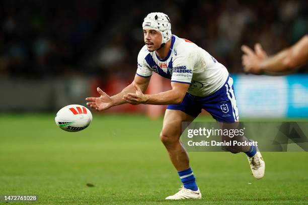 Reed Mahoney of the Bulldogs passes the ball during the round two NRL match between the Melbourne Storm and Canterbury Bulldogs at AAMI Park on March...