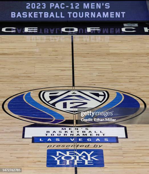 Pac-12 Conference men's basketball tournament logo is shown on the court before a semifinal game of the tournament at T-Mobile Arena on March 10,...