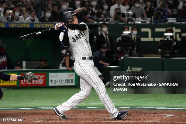 Shohei Ohtani of Japan hits a RBI double to make it 1-6 in the fourth inning during the World Baseball Classic Pool B game between Czech Republic and...