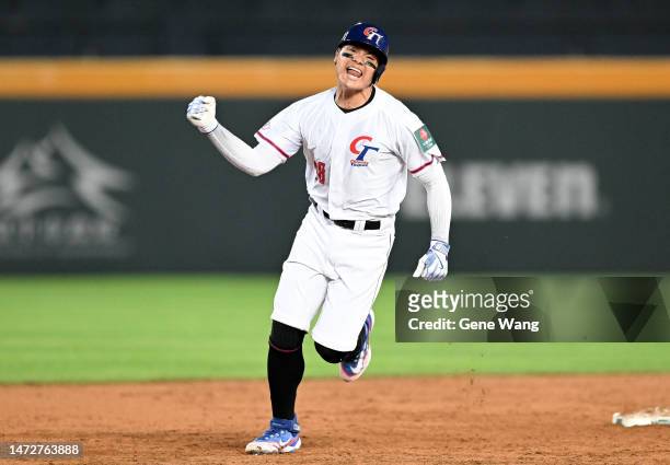 Yu Chang of Chinese Taipei hits a grand slam at the bottom of the 2nd inning during the World Baseball Classic Pool A game between Netherlands and...