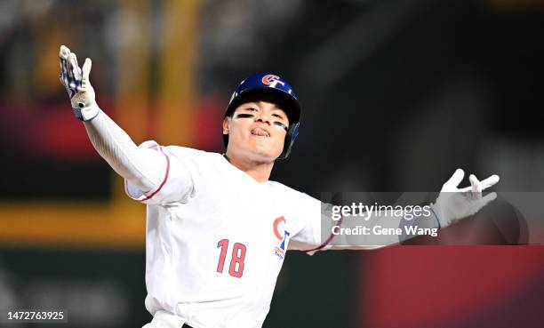 Yu Chang of Chinese Taipei hits a grand slam at the bottom of the 2nd inning during the World Baseball Classic Pool A game between Netherlands and...