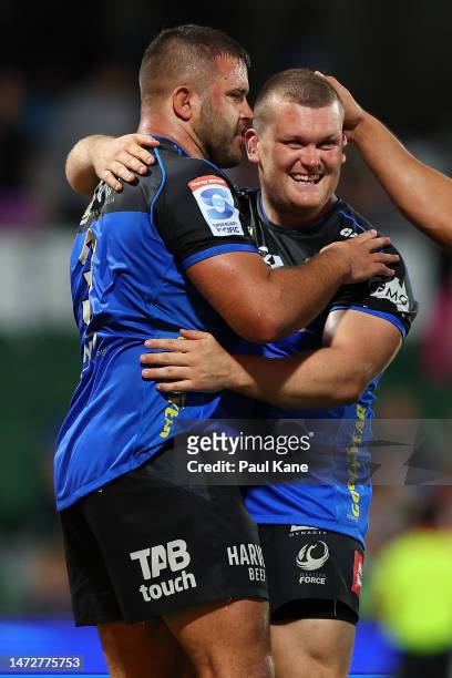 Santiago Medrano and Tom Robertson of the Force celebrate winning the round three Super Rugby Pacific match between Western Force and Moana Pasifika...