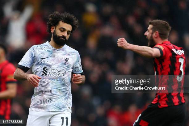 Mohamed Salah of Liverpool reacts after missing a penalty kick during the Premier League match between AFC Bournemouth and Liverpool FC at Vitality...