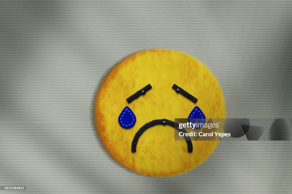 Sad felt emoji in felt