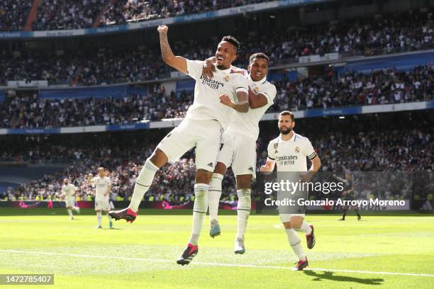 Eder Gabriel Militao of Real Madrid CF celebrates scoring their second goal with teammates Rodrygo Goes and Nacho Fernandez during the LaLiga...