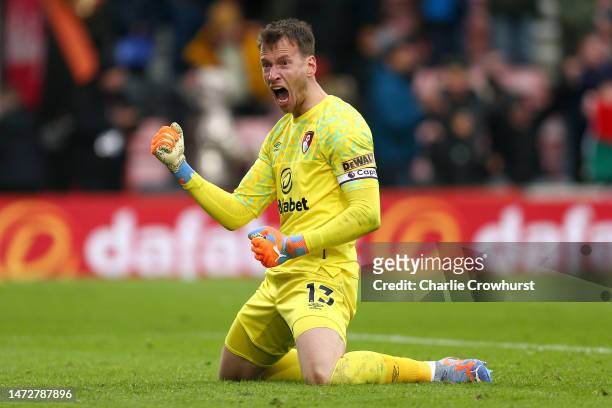Neto of AFC Bournemouth celebrates after the team's victory in the Premier League match between AFC Bournemouth and Liverpool FC at Vitality Stadium...