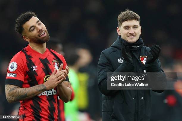 David Brooks of AFC Bournemouth applauds the fans with teammate Ryan Fredericks after the team's victory in the Premier League match between AFC...