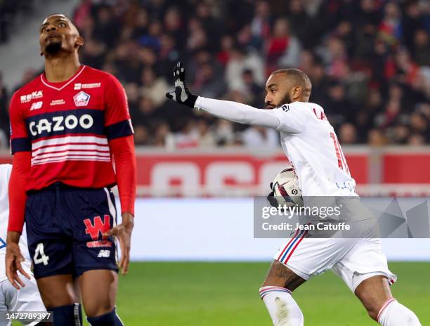 Alexandre Lacazette of Lyon celebrates his first goal during the Ligue 1 match between Lille OSC and Olympique Lyonnais at Stade Pierre-Mauroy on...