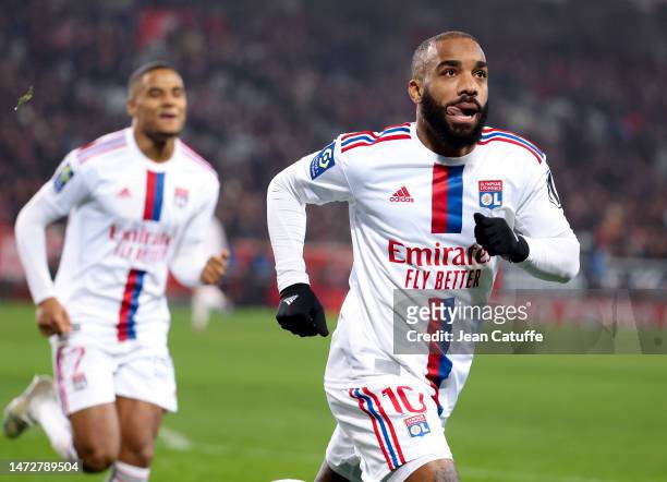 Alexandre Lacazette of Lyon celebrates his second goal during the Ligue 1 match between Lille OSC and Olympique Lyonnais at Stade Pierre-Mauroy on...